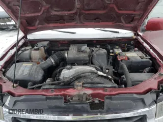 2010 GMC Canyon z VIN 1GTKTFDE5A8123398, wystawiony jako Copart lot #88504215 z przebiegiem 199 472 mil mil oraz Szkoda całkowita • Salvage title. Historia ofert i sprzedaży dostępna na DreamBid. Obrazek 11.