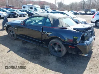 2000 Ford Mustang with VIN 1FAFP444XYF181018, listed as a IAAI auction lot 41943486 with 212,996 mi miles. Bid and sale history available at carsss.com. Image 3.