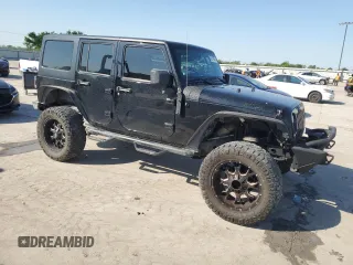2013 Jeep Wrangler Unlimited Freedom z VIN 1C4BJWDG0DL513902, wystawiony jako Copart lot #52045975 z przebiegiem 166 827 mil mil oraz Szkoda całkowita • Salvage title. Historia ofert i sprzedaży dostępna na DreamBid. Obrazek 4.