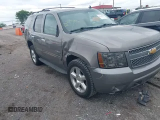 2012 Chevrolet Tahoe LT with VIN 1GNSCBE08CR136971, listed as a IAAI auction lot 42211242 with 214,910 mi miles and . Bid and sale history available at DreamBid. Image 1.