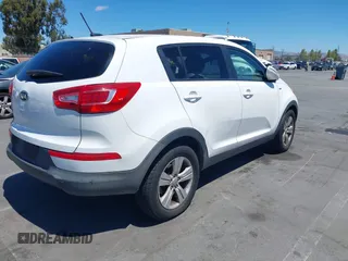 2012 Kia Sportage LX z VIN KNDPBCA21C7297706, wystawiony jako IAAI lot #42804922 z przebiegiem 187 840 mil mil oraz . Historia ofert i sprzedaży dostępna na DreamBid. Obrazek 4.