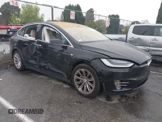 2018 Tesla Model X 75D with VIN 5YJXCBE25JF117801, listed as a IAAI auction lot 41798116 with 95,253 mi miles. Bid and sale history available at carsss.com. Image 1.