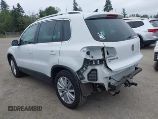 2016 Volkswagen Tiguan SE z VIN WVGBV7AX4GW508103, wystawiony jako IAAI lot #42473754 z przebiegiem 104 978 mil mil oraz . Historia ofert i sprzedaży dostępna na DreamBid. Obrazek 3.