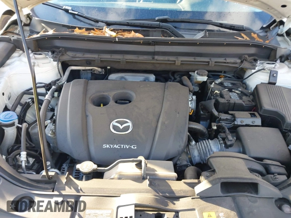 2020 Mazda CX-5 Sport with VIN JM3KFABMXL1824574, listed as a IAAI auction lot 41029057 with 47,760 mi miles. Bid and sale history available at carsss.com. Image 10.