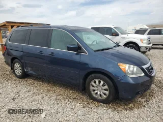 2009 Honda Odyssey EX-L with VIN 5FNRL38629B409446, listed as a Copart auction lot 54736045 with 176,229 mi miles and Salvage Title. Bid and sale history available at DreamBid. Image 4.