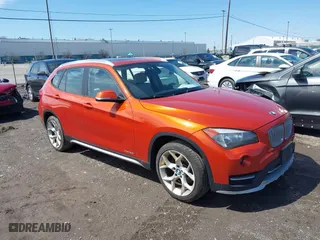 2015 BMW X1 xDrive28i with VIN WBAVL1C57FVY27822, listed as a IAAI auction lot 41977545 with 76,211 mi miles. Bid and sale history available at carsss.com. Image 1.