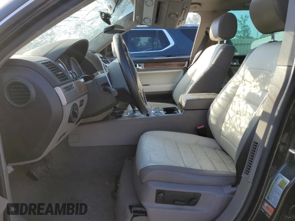 2010 Volkswagen Touareg VR6 with VIN WVGBF7A92AD002237, listed as a Copart auction lot 73919754 with 124,072 mi miles and Salvage Title. Bid and sale history available at DreamBid. Image 7.