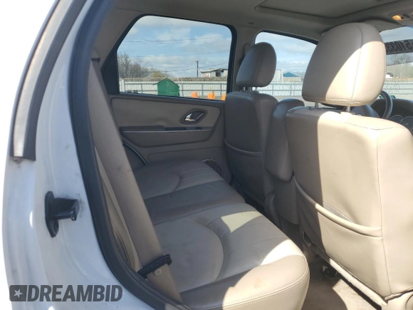 2006 Mercury Mariner Luxury with VIN 4M2CU571X6KJ18979, listed as a Copart auction lot 51033545 with 210,581 mi miles and Salvage title. Bid and sale history available at DreamBid. Image 11.