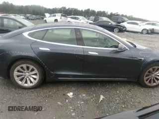2016 Tesla Model S 70 with VIN 5YJSA1E13GF174542, listed as a IAAI auction lot 41169279 with 72,691 mi miles and . Bid and sale history available at DreamBid. Image 13.