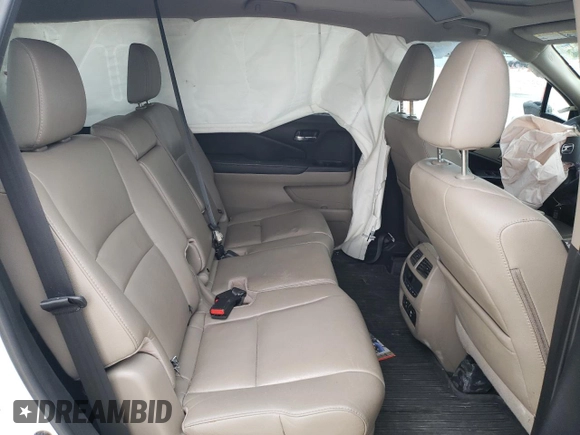 2017 Honda Pilot Touring with VIN 5FNYF5H95HB015365, listed as a Copart auction lot 52371205 with 153,141 mi miles and Salvage title. Bid and sale history available at DreamBid. Image 11.