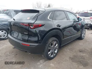 2023 Mazda CX-30 S Carbon Edition with VIN 3MVDMBCMXPM553129, listed as a IAAI auction lot 41864876 with 18,317 mi miles and . Bid and sale history available at DreamBid. Image 4.