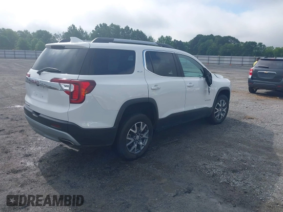 2023 GMC Acadia SLT with VIN 1GKKNML4XPZ156685, listed as a IAAI auction lot 42231988 with 61,094 mi miles and . Bid and sale history available at DreamBid. Image 4.