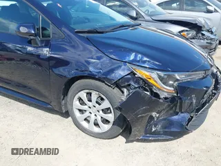 2023 Toyota Corolla LE with VIN 5YFB4MDE2PP052532, listed as a IAAI auction lot 42169698 with 32,622 mi miles. Bid and sale history available at carsss.com. Image 6.