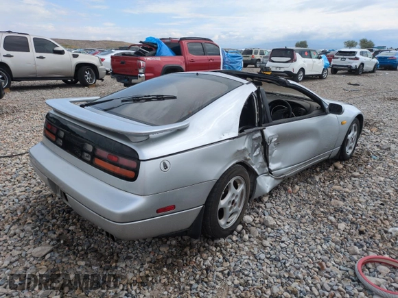 1993 Nissan 300ZX z VIN GCZ32546193, wystawiony jako Copart lot #54944495 z przebiegiem 140 834 mil mil oraz Szkoda całkowita • Salvage title. Historia ofert i sprzedaży dostępna na DreamBid. Obrazek 3.