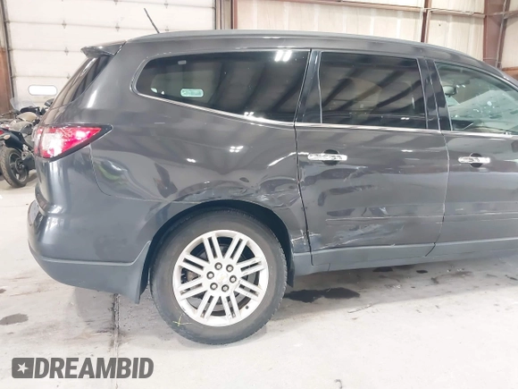 2015 Chevrolet Traverse LT with VIN 1GNKVGKD2FJ349545, listed as a IAAI auction lot 42721056 with 59,876 mi miles and . Bid and sale history available at DreamBid. Image 6.