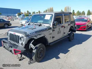 2015 Jeep Wrangler Unlimited Sport with VIN 1C4BJWDG7FL587014, listed as a IAAI auction lot 40641034 with 81,045 mi miles. Bid and sale history available at carsss.com. Image 18.