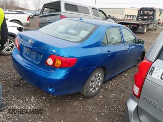 2010 Toyota Corolla with VIN 2T1BU4EE0AC392977, listed as a IAAI auction lot 40735837 with 177,306 mi miles. Bid and sale history available at carsss.com. Image 4.