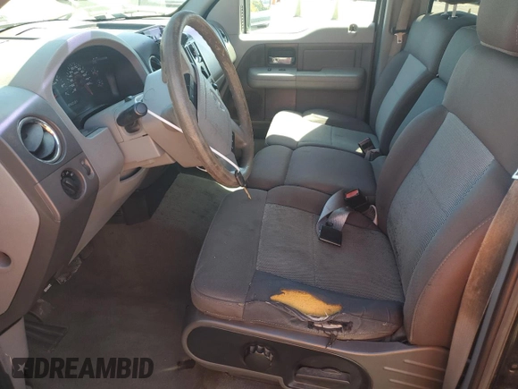 2005 Ford F-150 XLT with VIN 1FTRW12WX5KD67643, listed as a Copart auction lot 48332695 with 254,546 mi miles and Salvage Title. Bid and sale history available at carsss.com. Image 7.