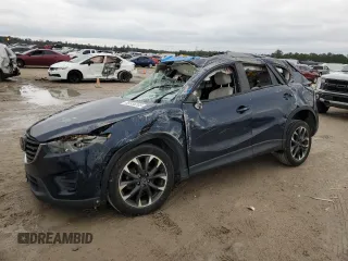 2016 Mazda CX-5 Grand Touring with VIN JM3KE4DY3G0797301, listed as a Copart auction lot 88356205 with Not Provided miles and Non Repairable. Bid and sale history available at carsss.com. Image 1.