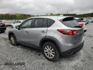 2013 Mazda CX-5 Touring with VIN JM3KE2CE1D0115023, listed as a Copart auction lot 52017905 with 174,254 mi miles and Clean Title. Bid and sale history available at carsss.com. Image 2.