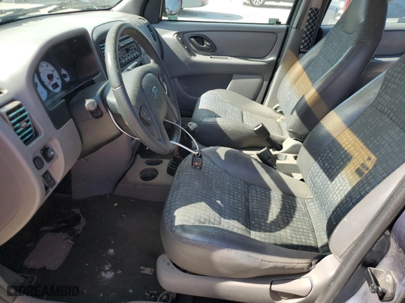 2001 Ford Escape XLS with VIN 1FMYU01BX1KB53168, listed as a Copart auction lot 76547834 with 71,025 mi miles and Salvage Title. Bid and sale history available at carsss.com. Image 7.