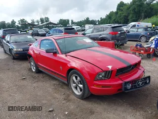 2007 Ford Mustang Deluxe with VIN 1ZVFT80N875206771, listed as a IAAI auction lot 42672678 with 163,045 mi miles and . Bid and sale history available at DreamBid. Image 1.