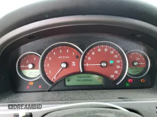 2004 Pontiac GTO z VIN 6G2VX12G74L183006, wystawiony jako Copart lot #58619105 z przebiegiem 281 390 mil mil oraz Tytuł czysty. Historia ofert i sprzedaży dostępna na DreamBid. Obrazek 9.
