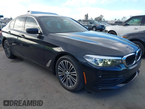2019 BMW 5 Series 530i with VIN WBAJA5C54KWW45379, listed as a IAAI auction lot 41276092 with 77,025 mi miles. Bid and sale history available at carsss.com. Image 1.