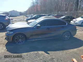 2021 BMW 3 Series 330i xDrive with VIN 3MW5R7J00M8B97750, listed as a IAAI auction lot 41810399 with 60,771 mi miles and . Bid and sale history available at DreamBid. Image 14.