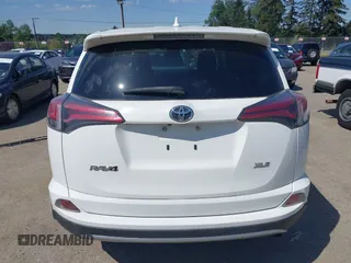 2018 Toyota RAV4 XLE with VIN JTMWFREV3JD130995, listed as a IAAI auction lot 42183630 with 56,624 mi miles. Bid and sale history available at carsss.com. Image 17.