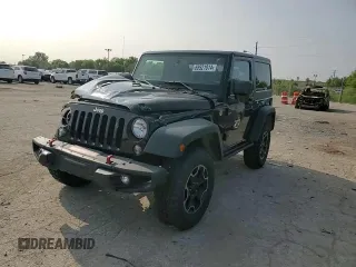 2015 Jeep Wrangler Rubicon Hard Rock z VIN 1C4BJWCG9FL714606, wystawiony jako Copart lot #68521014 z przebiegiem 35 187 mil mil oraz Szkoda całkowita • Salvage title. Historia ofert i sprzedaży dostępna na DreamBid. Obrazek 11.