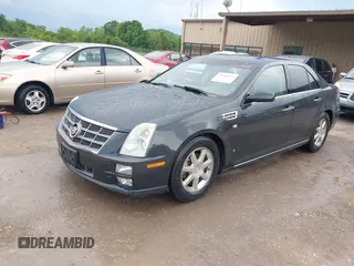2008 Cadillac STS RWD with VIN 1G6DK67V980165768, listed as a IAAI auction lot 42185454 with 214,813 mi miles and . Bid and sale history available at DreamBid. Image 2.