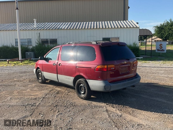 1999 Toyota Sienna LE with VIN 4T3ZF13C5XU141279, listed as a Copart auction lot 64366315 with 218,223 mi miles and Clean title. Bid and sale history available at DreamBid. Image 3.