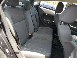 2014 Ford Fiesta SE z VIN 3FADP4BJ9EM176730, wystawiony jako Copart lot #58806365 z przebiegiem 93 814 mil mil oraz Szkoda całkowita • Salvage title. Historia ofert i sprzedaży dostępna na DreamBid. Obrazek 10.