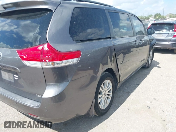 2014 Toyota Sienna XLE with VIN 5TDYK3DC0ES513076, listed as a IAAI auction lot 42724629 with 154,019 mi miles and . Bid and sale history available at DreamBid. Image 4.
