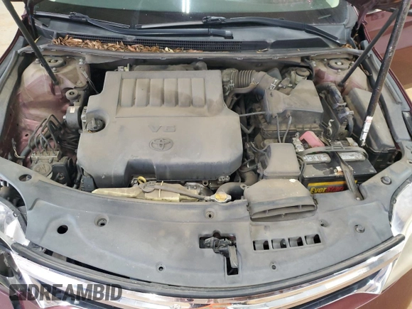 2013 Toyota Avalon XLE z VIN 4T1BK1EB8DU023894, wystawiony jako Copart lot #59971355 z przebiegiem 231 795 mil mil oraz Szkoda całkowita • Salvage title. Historia ofert i sprzedaży dostępna na DreamBid. Obrazek 11.