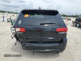 2018 Jeep Grand Cherokee Laredo E with VIN 1C4RJEAG4JC182430, listed as a Copart auction lot 50740255 with 117,944 mi miles and Salvage title. Bid and sale history available at DreamBid. Image 6.