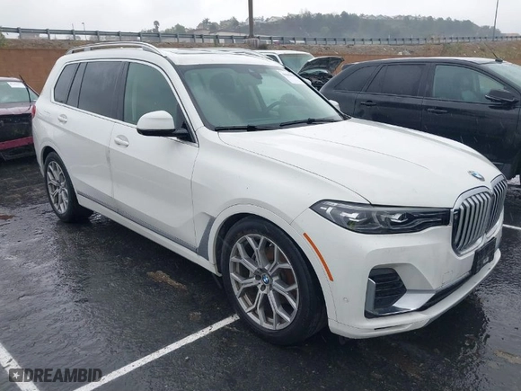 2019 BMW X7 xDrive40i with VIN 5UXCW2C57KL084137, listed as a IAAI auction lot 41662958 with 34,751 mi miles. Bid and sale history available at carsss.com. Image 1.