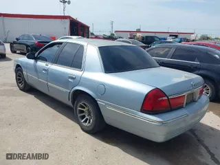 2002 Mercury Grand Marquis LS Premium with VIN 2MEFM75W32X626469, listed as a IAAI auction lot 42015115 with 111,952 mi miles. Bid and sale history available at carsss.com. Image 3.