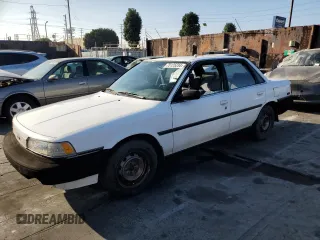 1990 Toyota Camry z VIN JT2SV21E3L0349179, wystawiony jako Copart lot #75125234 z przebiegiem 138 635 mil mil oraz Czysty tytuł • Clean title. Historia ofert i sprzedaży dostępna na DreamBid. Obrazek 1.
