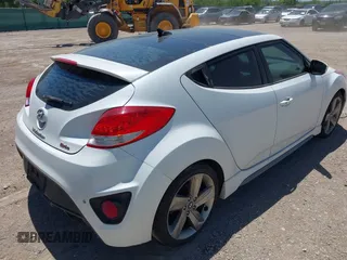 2013 Hyundai Veloster Turbo w/Black Int with VIN KMHTC6AE4DU122078, listed as a IAAI auction lot 42086862 with 203,692 mi miles. Bid and sale history available at carsss.com. Image 4.