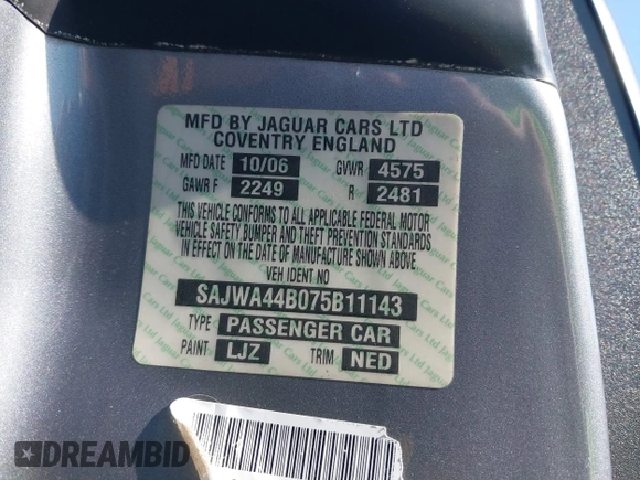 2007 Jaguar XK with VIN SAJWA44B075B11143, listed as a IAAI auction lot 42044257 with 122,842 mi miles. Bid and sale history available at carsss.com. Image 9.