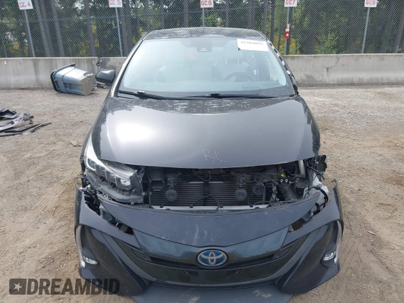 2021 Toyota Prius LE z VIN JTDKAMFP0M3179016, wystawiony jako IAAI lot #42204095 z przebiegiem 34 691 mil mil oraz . Historia ofert i sprzedaży dostępna na DreamBid. Obrazek 13.