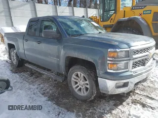 2014 Chevrolet Silverado 1500 LT with VIN 1GCVKREC0EZ291142, listed as a IAAI auction lot 41288155 with 112,384 mi miles and . Bid and sale history available at DreamBid. Image 1.