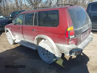 2000 Mitsubishi Montero Sport LS with VIN JA4MT31H8YP047756, listed as a IAAI auction lot 41704702 with 165,343 mi miles. Bid and sale history available at carsss.com. Image 3.
