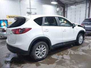 2014 Mazda CX-5 Touring with VIN JM3KE4CY4E0349034, listed as a IAAI auction lot 41478954 with 117,502 mi miles. Bid and sale history available at carsss.com. Image 4.