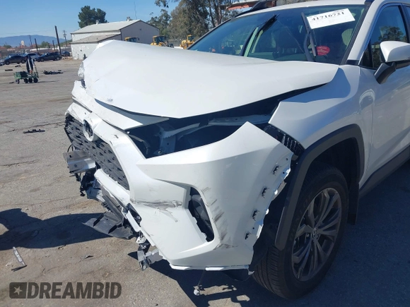 2024 Toyota RAV4 Hybrid XLE Premium with VIN JTMB6RFV3RJ059534, listed as a IAAI auction lot 41716721 with 6,319 mi miles. Bid and sale history available at carsss.com. Image 6.