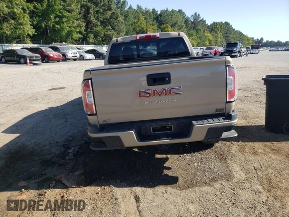 2021 GMC Canyon 2WD Elevation with VIN 1GTG5CEN8M1182021, listed as a Copart auction lot 74089124 with 115,581 mi miles and Salvage Title. Bid and sale history available at carsss.com. Image 6.