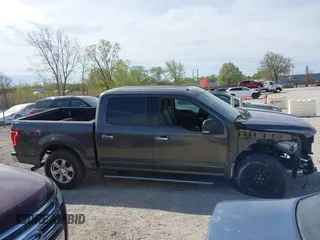 2015 Ford F-150 XLT with VIN 1FTEW1EF8FFC27966, listed as a IAAI auction lot 42104000 with 89,359 mi miles and . Bid and sale history available at DreamBid. Image 14.