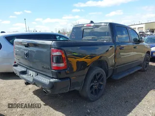 2023 Ram 1500 Laramie with VIN 1C6SRFJT6PN542105, listed as a IAAI auction lot 41974428 with 74,489 mi miles and . Bid and sale history available at DreamBid. Image 4.